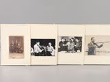 an old photo of a group of people posing for a picture