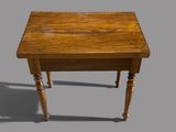 a small wooden table with two legs on a gray background
