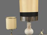 two lamps that are sitting next to each other on a table