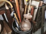 many different types of umbrellas that are in a bucket