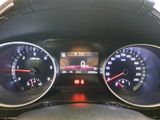 a close up of a car dashboard with various gauges