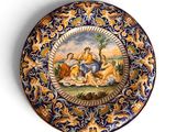 une image représentant une assiette décorative ornée d'une peinture
