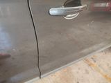 a close up of a door handle on a car