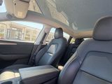 the interior of a car with the sun shining through the windshield