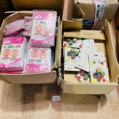 two boxes of supplies that are sitting on the floor
