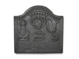 an image of a cast iron plaque with a crown on it