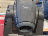 a moving light that is sitting on top of a box