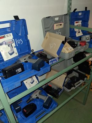 many tools on a shelf in a room