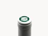 a bottle of wine that is sitting on a table