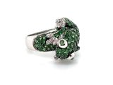 an image of a ring with green and white diamonds on it