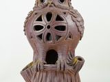 a lamp that is sitting on top of a tree stump
