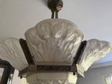 a chandelier hanging from the ceiling in a room