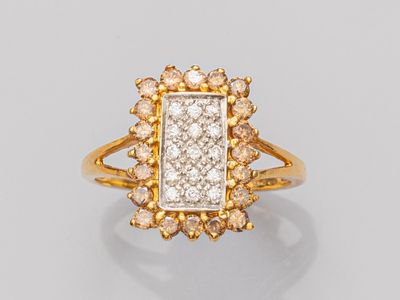 Bague rectangulaire en or 750°/°°(18K) deux tons, sertie de …