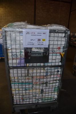 a cart with a lot of items on it in a warehouse