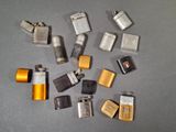 many different types of lighters and lighter lighters on the table