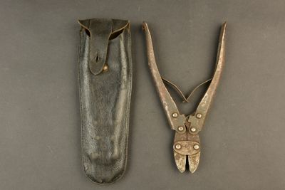 a pair of pliers sitting next to each other on a table