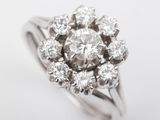 an image of a diamond cluster ring on a white background