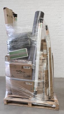 a stack of boxes on a pallet in a warehouse