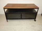 an image of a coffee table on wheels in a room