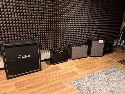 a room with a bunch of speakers in it