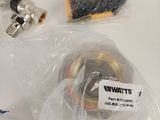 many different types of electronic components on the table