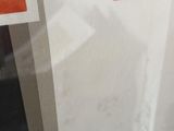 a picture of a picture of a red cross on the wall
