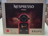a box of nespresso krups on a table in a store