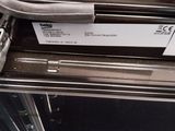 a piece of paper sitting on top of an oven