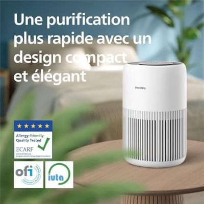 un purificateur d'air blanc posé sur une table en bois