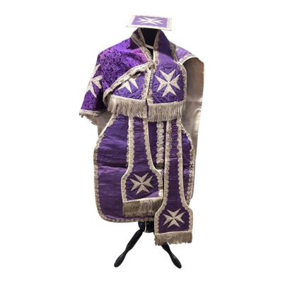 an image of a purple and white dress on a mannequin stand
