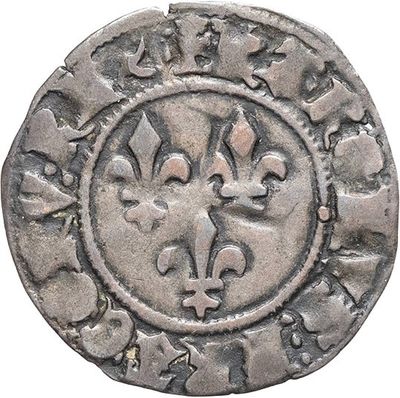 a close up of a silver coin with fleurons on it