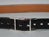 a belt that has a buckle on it that is attached to a belt
