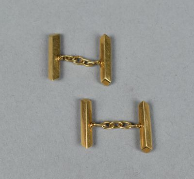 pair of gold tone cufflinks with chain links