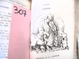 un livre ouvert avec l'image d'un homme et d'un chien