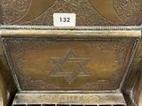 a metal box that has a star of david on it