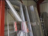 a lot of steel bars stacked on top of each other