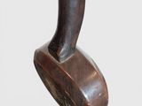 an image of a wooden sculpture of a man ' s foot