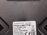 a close up of a remote control on a table