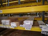 a large amount of boxes on the shelves in the warehouse