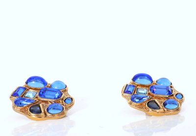 pair of blue glass and goldtone earrings on a white background