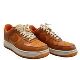 a pair of shoes that are on a white surface