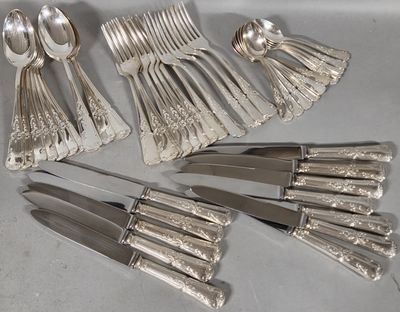 a lot of silver spoons and forks on the table