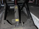 an image of a car being lifted by a lifter