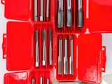 a close up of a bunch of tools in a red case