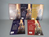 four books of the famous fairy series are lined up on a table