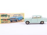 an image of a toy car next to a box of cigarettes