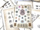 a pile of old papers and stamps on a table