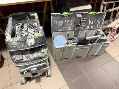 two suitcases that are sitting next to each other on the floor
