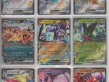 a close up of a bunch of pokemon cards on a table