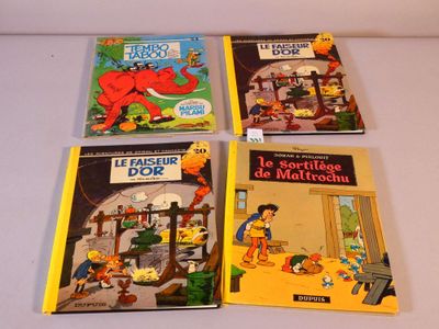 trois livres pour enfants sont alignés sur une surface blanche